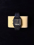 Reloj Casio AQ230 de Acero Inoxidable con Acabado Oscuro y Esfera Negra