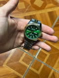 Reloj Rolex Oyster Perpetual Day-Date – Esfera Verde Esmeralda con Bisel Estriado y Brazalete Two-Tone